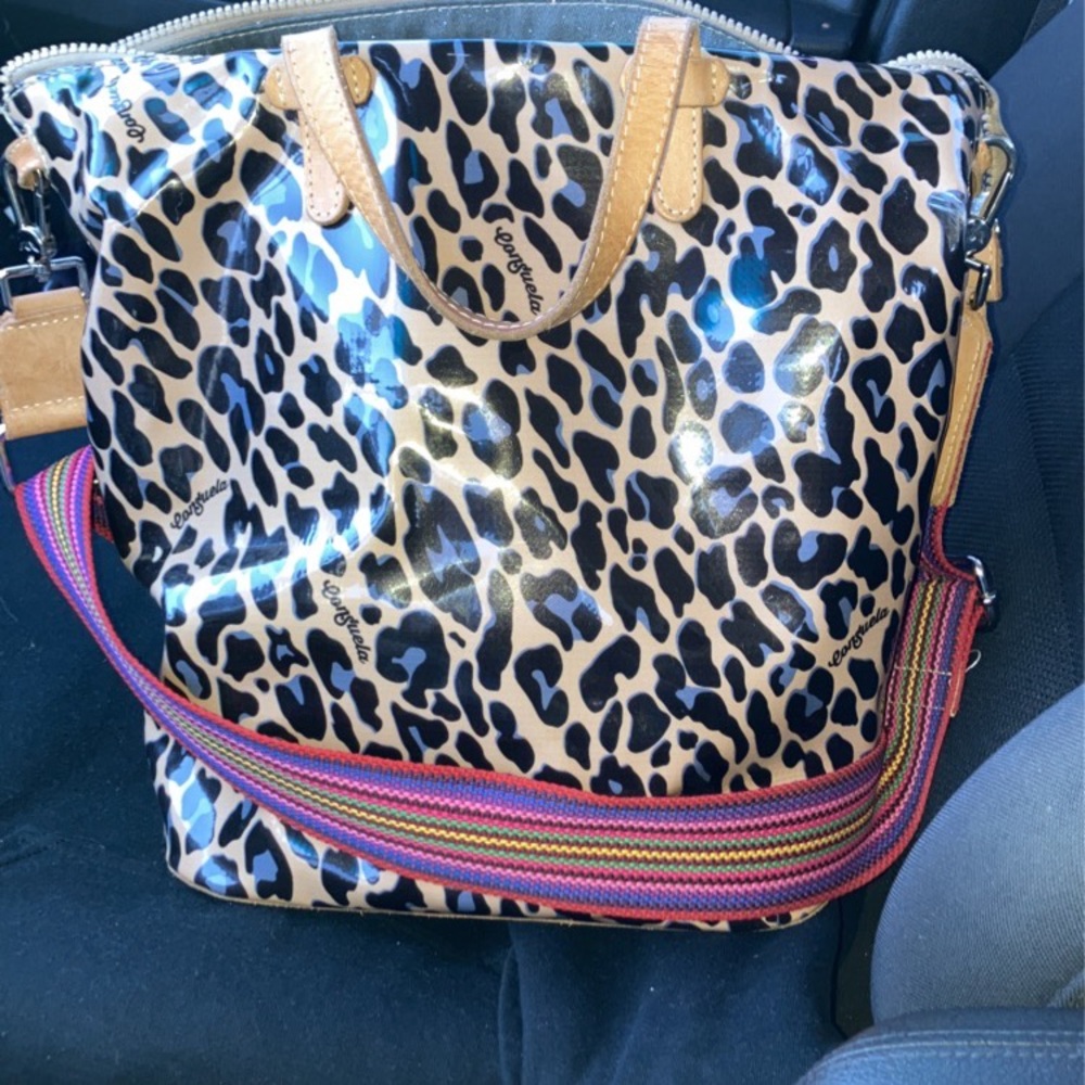 Blue Jag Sling the exterior is a waterproof plastic, 14 ½” (W) x 13” (H) x 6